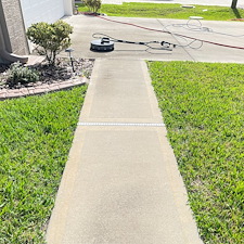 Transforming-Driveways-in-Palm-Coast-Stunning-Results-from-Our-Latest-Cleaning-Project 1